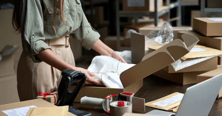 Woman preparing to ship her e-commerce products